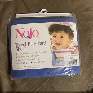 Travel play yard sheet still in the package